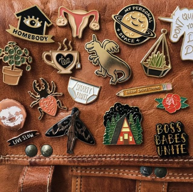 History and Origins of Enamel pins – All you Need to Know - WhiteOut Press